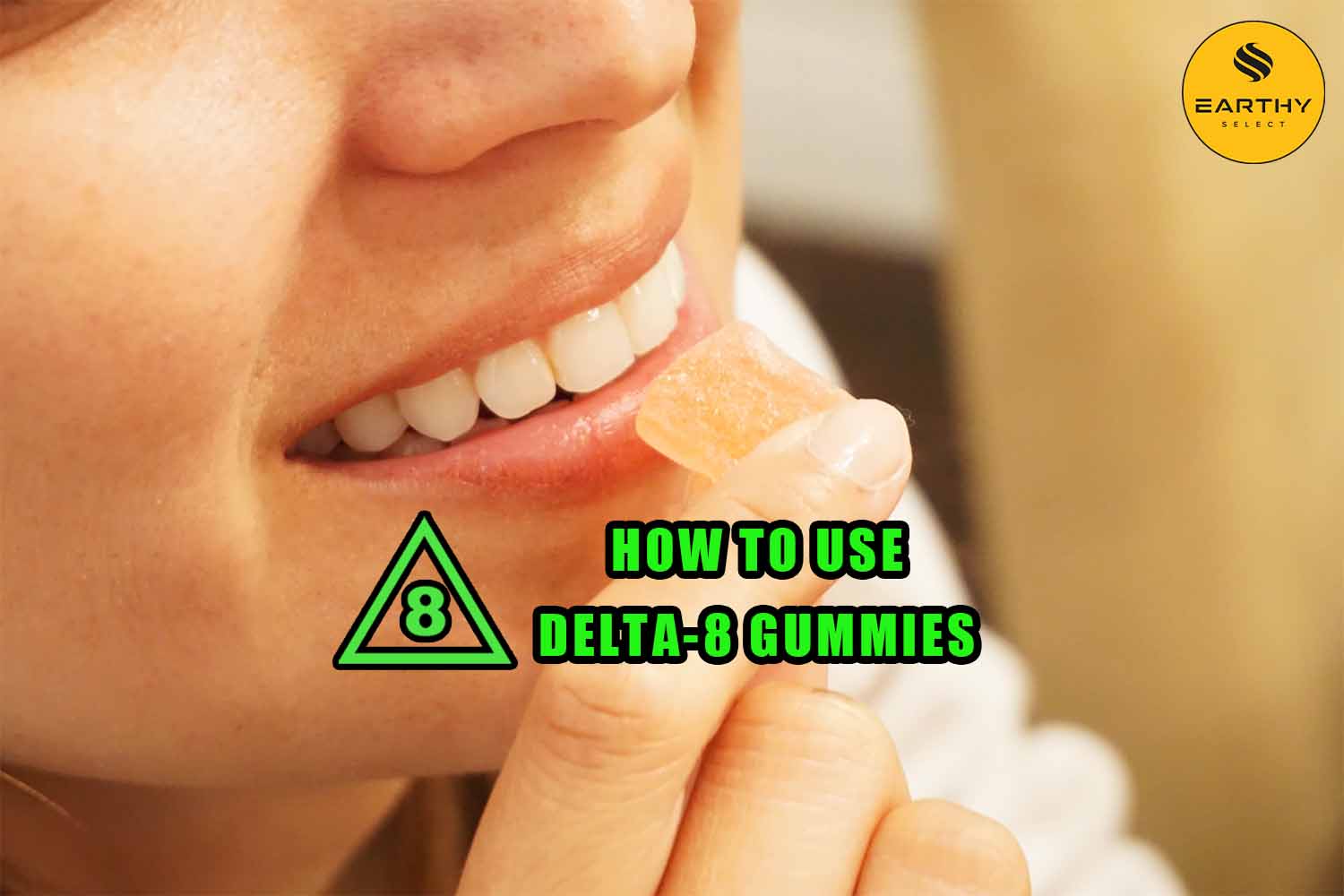 Woman holds a delta-8 gummy near her mouth and smiles. How to use delta 8 gummies. Earthy Select logo