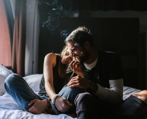 A Couple Smoking A Joint