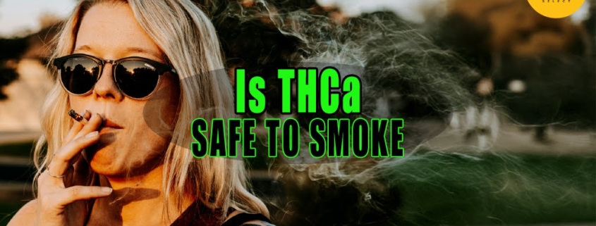 Woman wearing sunglasses smoking a THCa joint.