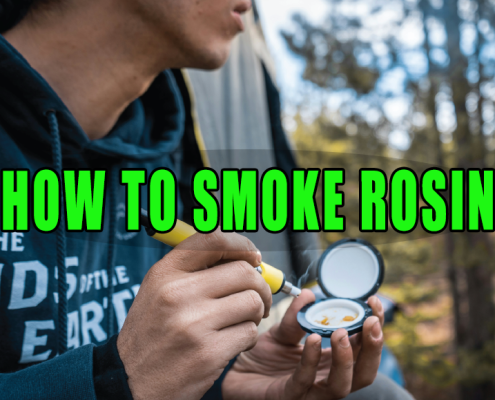Man using dipping device to smoke rosin