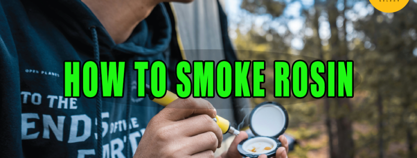 Man using dipping device to smoke rosin